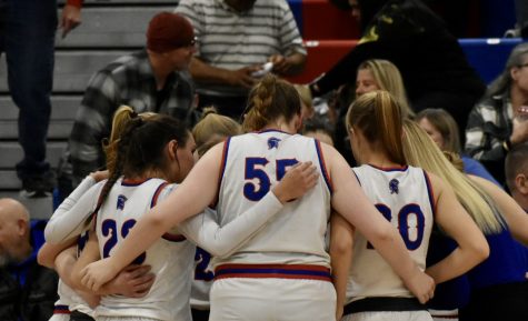 The team huddles during a time out