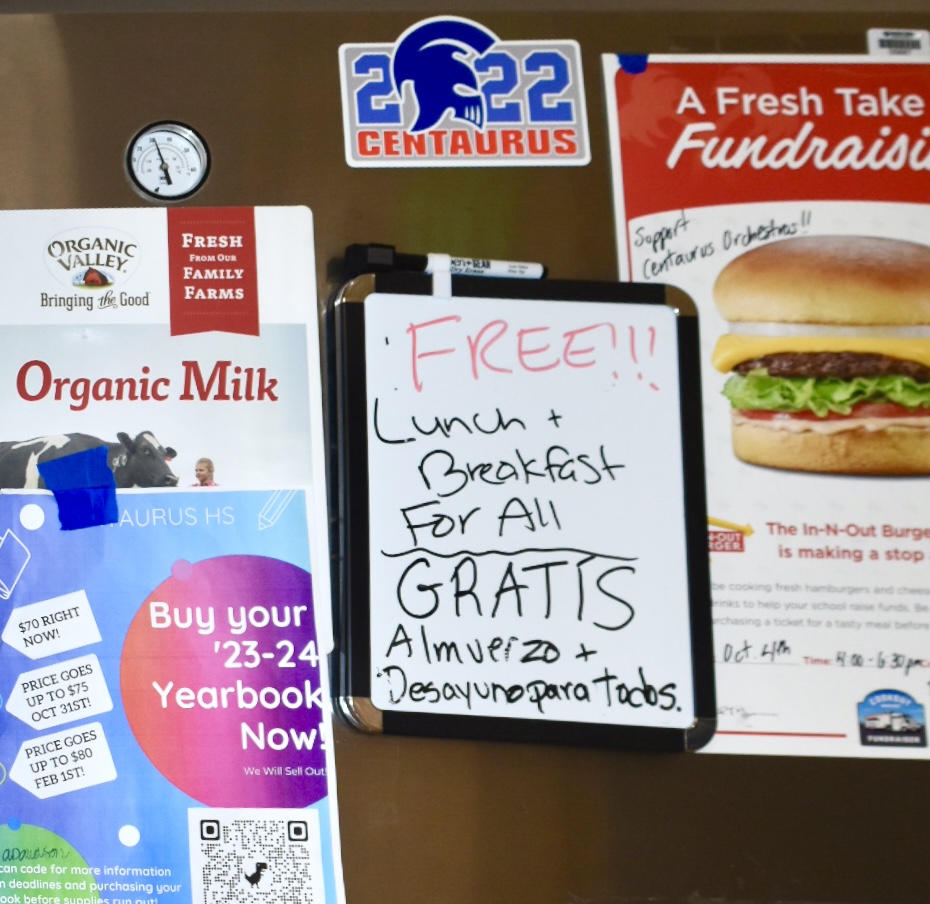 A sign drawn on a whiteboard in the cafeteria, announcing the free lunch progam 