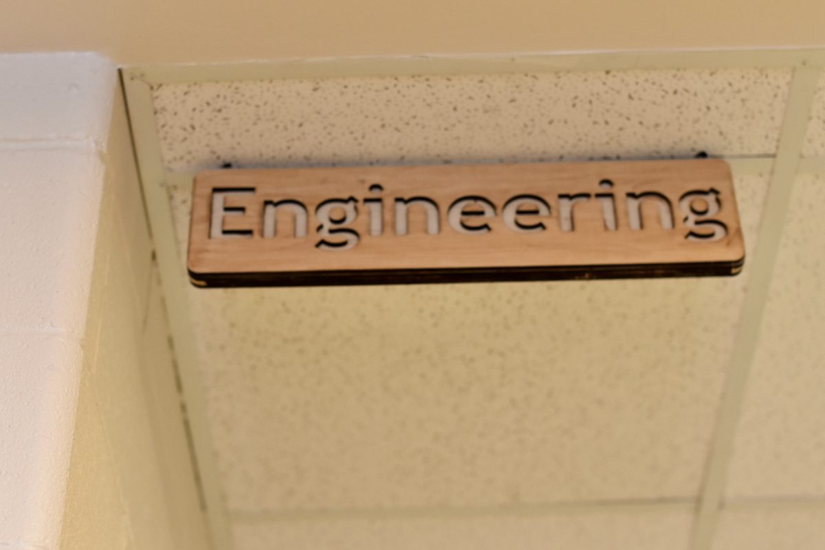 The sign that currently resides outside the Engineering wing; soon, all classrooms wil have a matching one.
