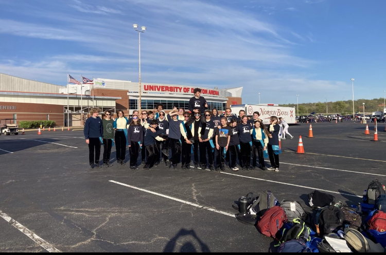 The entire Winter Percussion ensemble gathers for a photo outside of the world championships in Dayton, Ohio. Photo dinated by Lily Adams. 