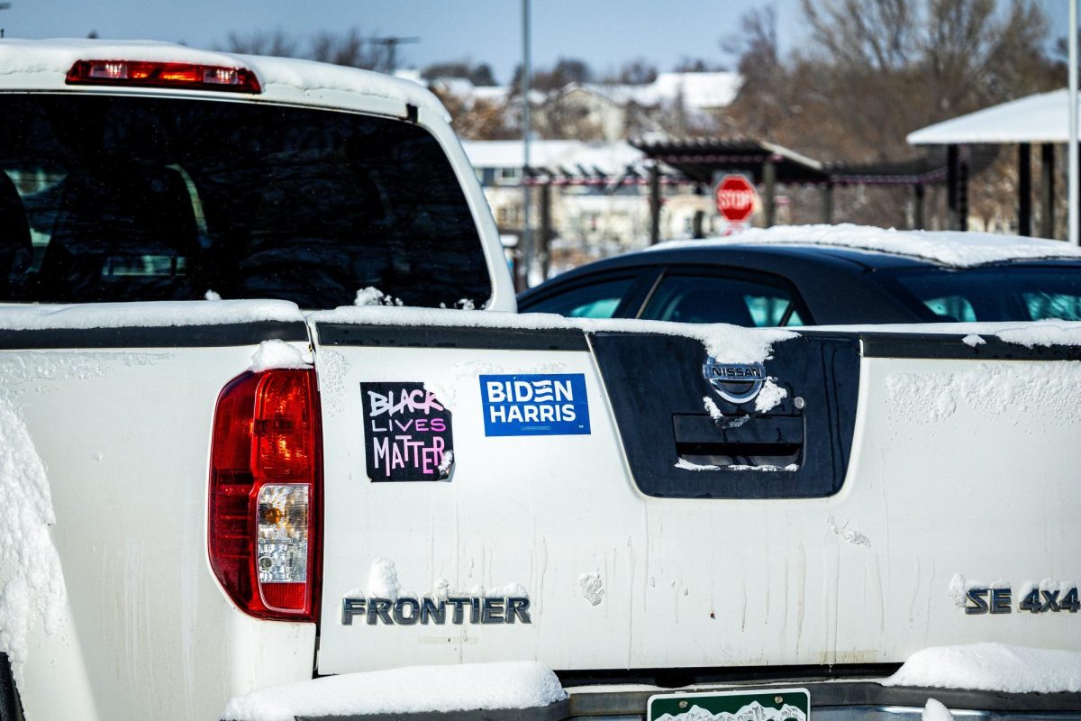 A truck outside of the Jan. 20th MLK march with two bumper stickers that read "Black Lives Matter" and "Biden/Harris."