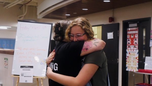 Ms. Jen hugs Cydney Moore